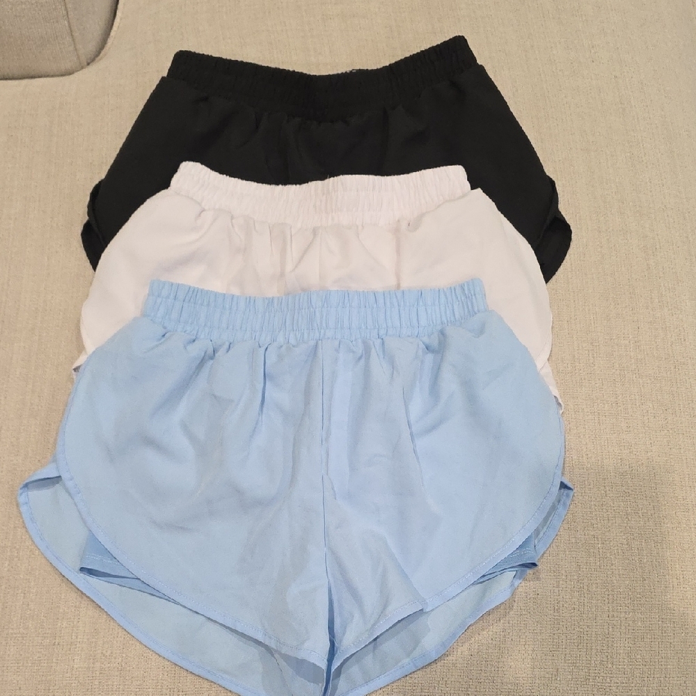 Set of Three Athletic Shorts in Black, White, and Light Blue